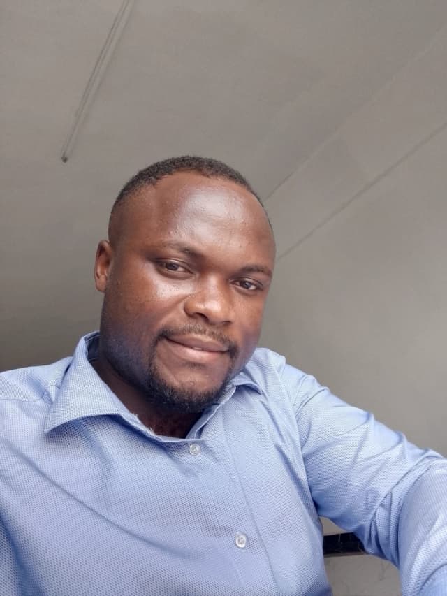 Check Billy Mbaku